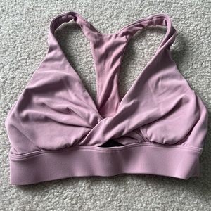 Lululemon light pink racer back sports bra with twist in front